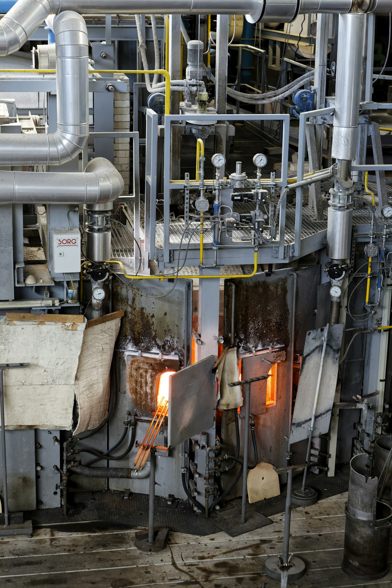 Industrial machinery on a plant floor. Illustrative photo.