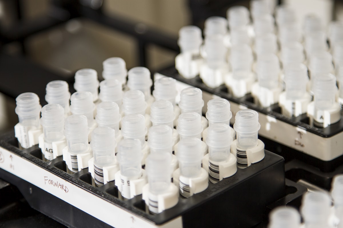 Rack of labelled sample tubes on a medical laboratory bench